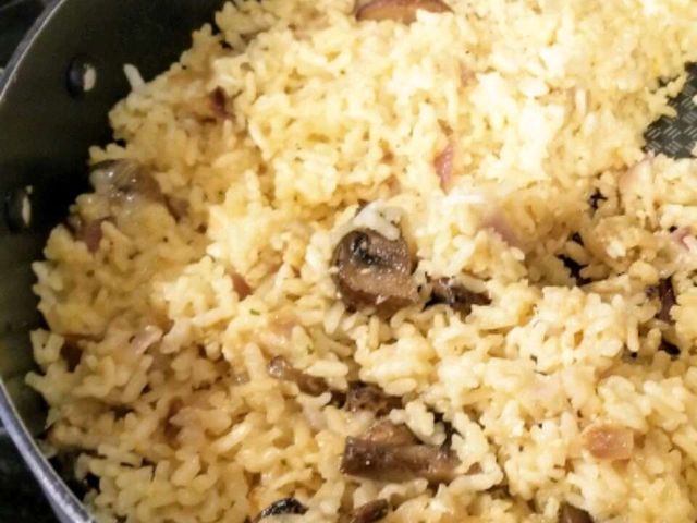 Плов из риса арборио с пармезаном и черным перцем